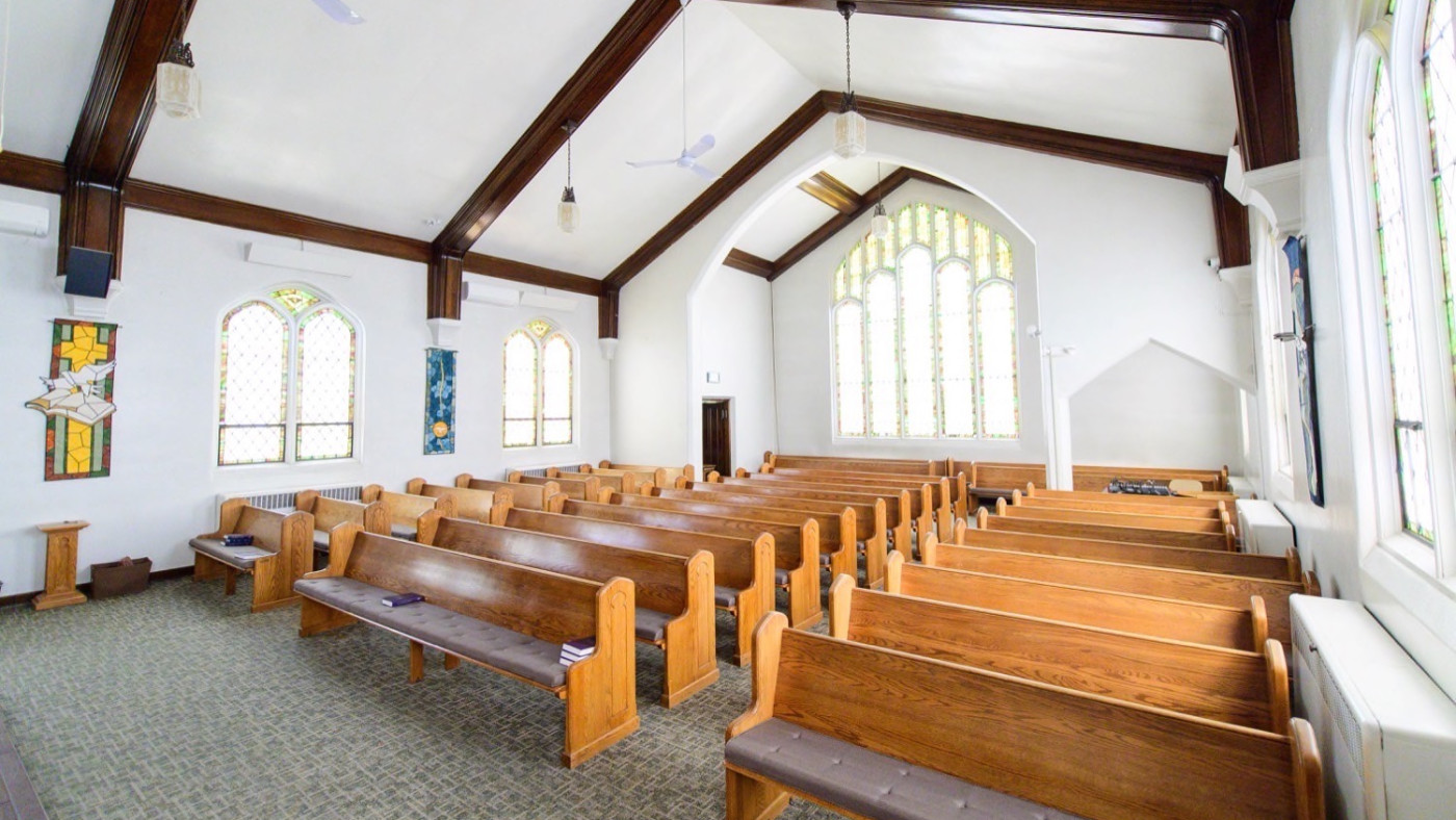 Interior Logan church with pews